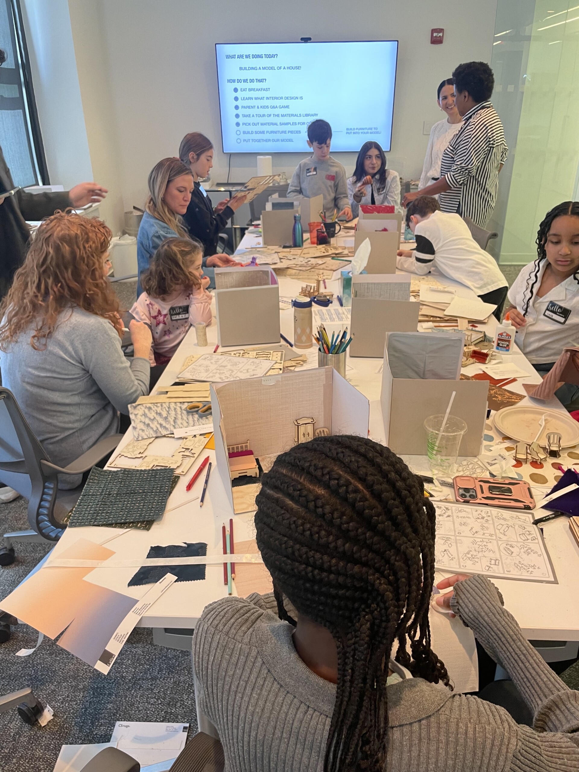 Children build 3-d mockup of their dream house for Pembrooke & Ives Bring your kids to work day