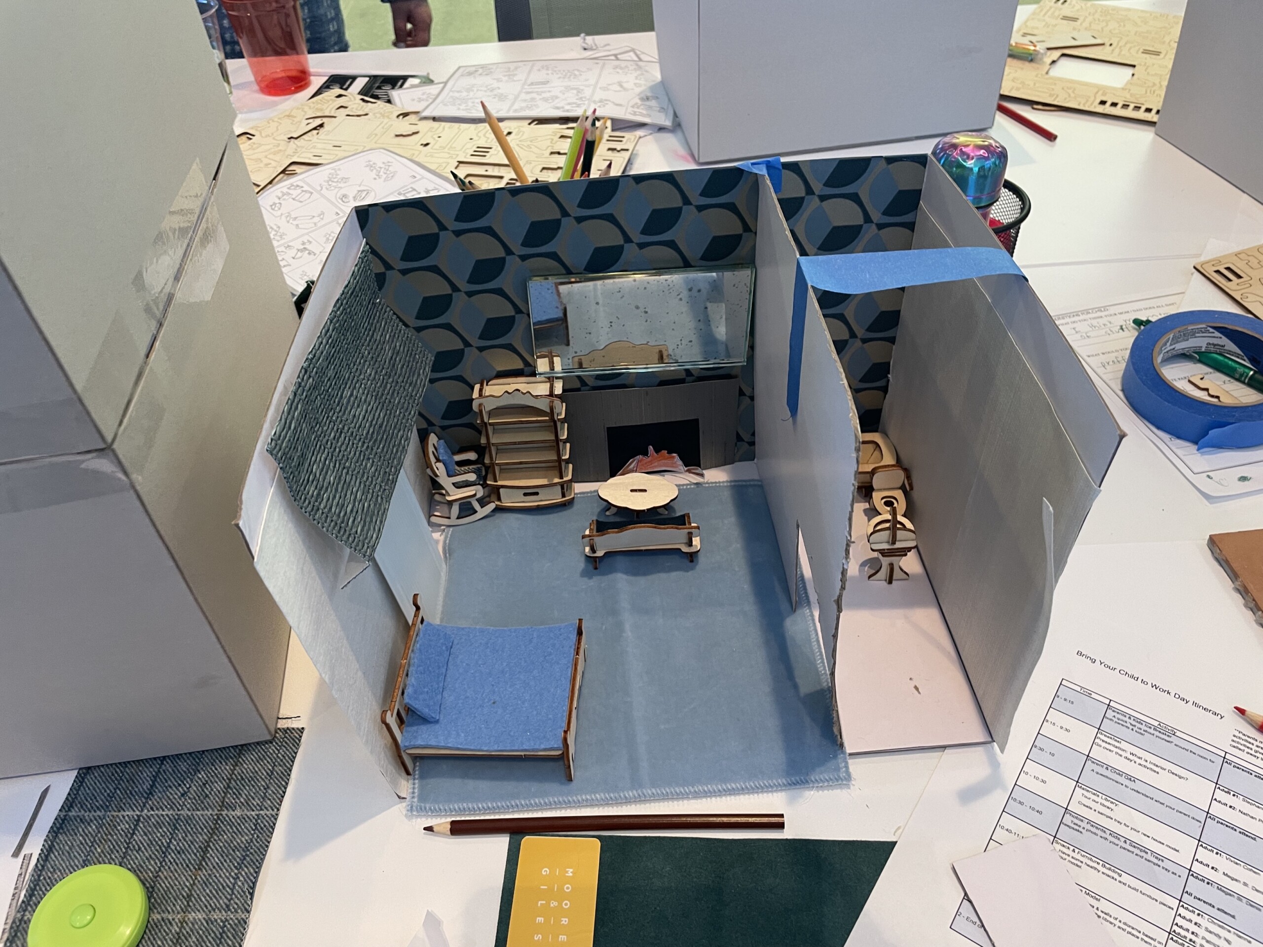 Children build 3-d mockup of their dream house for Pembrooke & Ives Bring your kids to work day