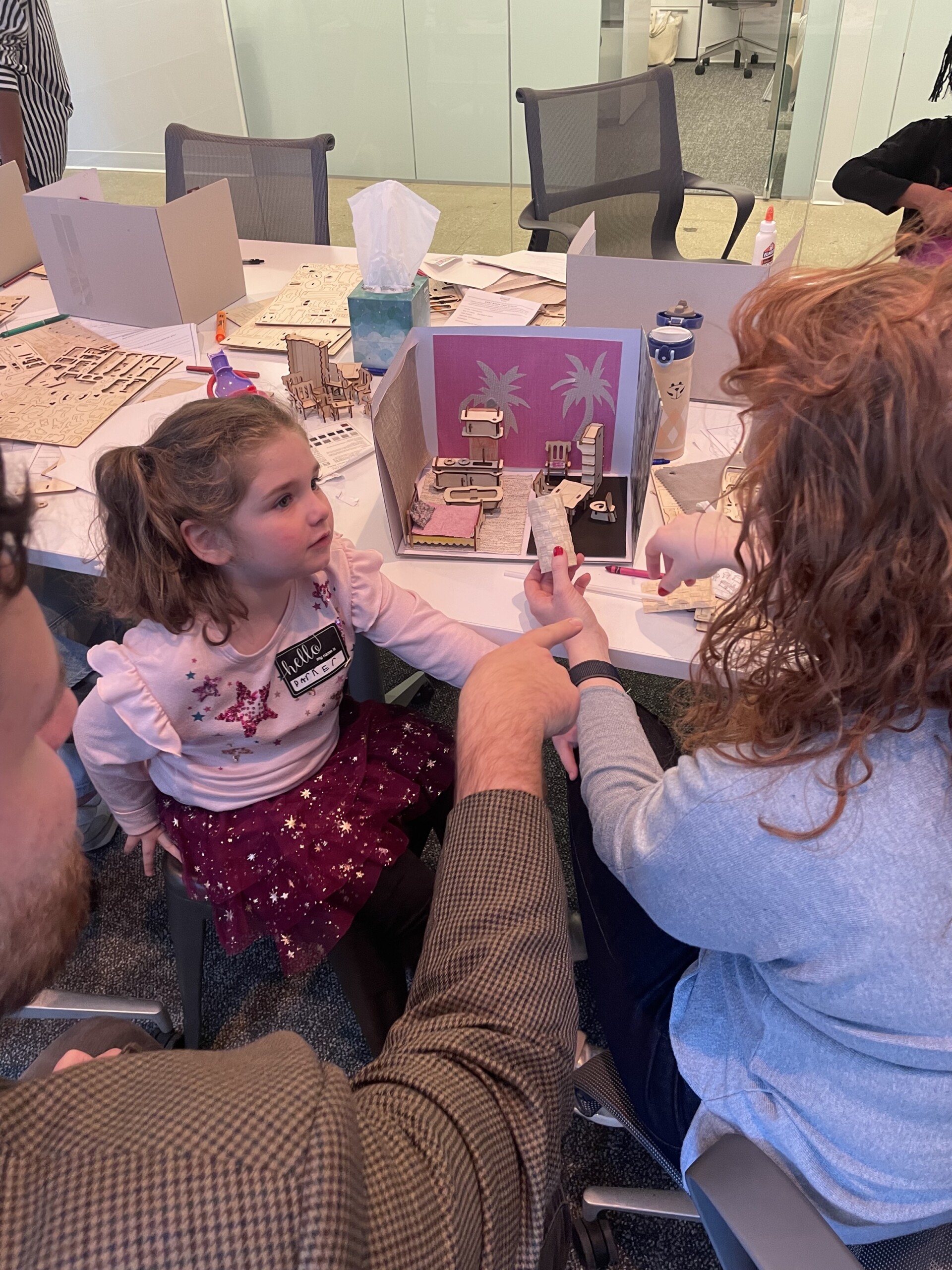 Children build 3-d mockup of their dream house for Pembrooke & Ives Bring your kids to work day