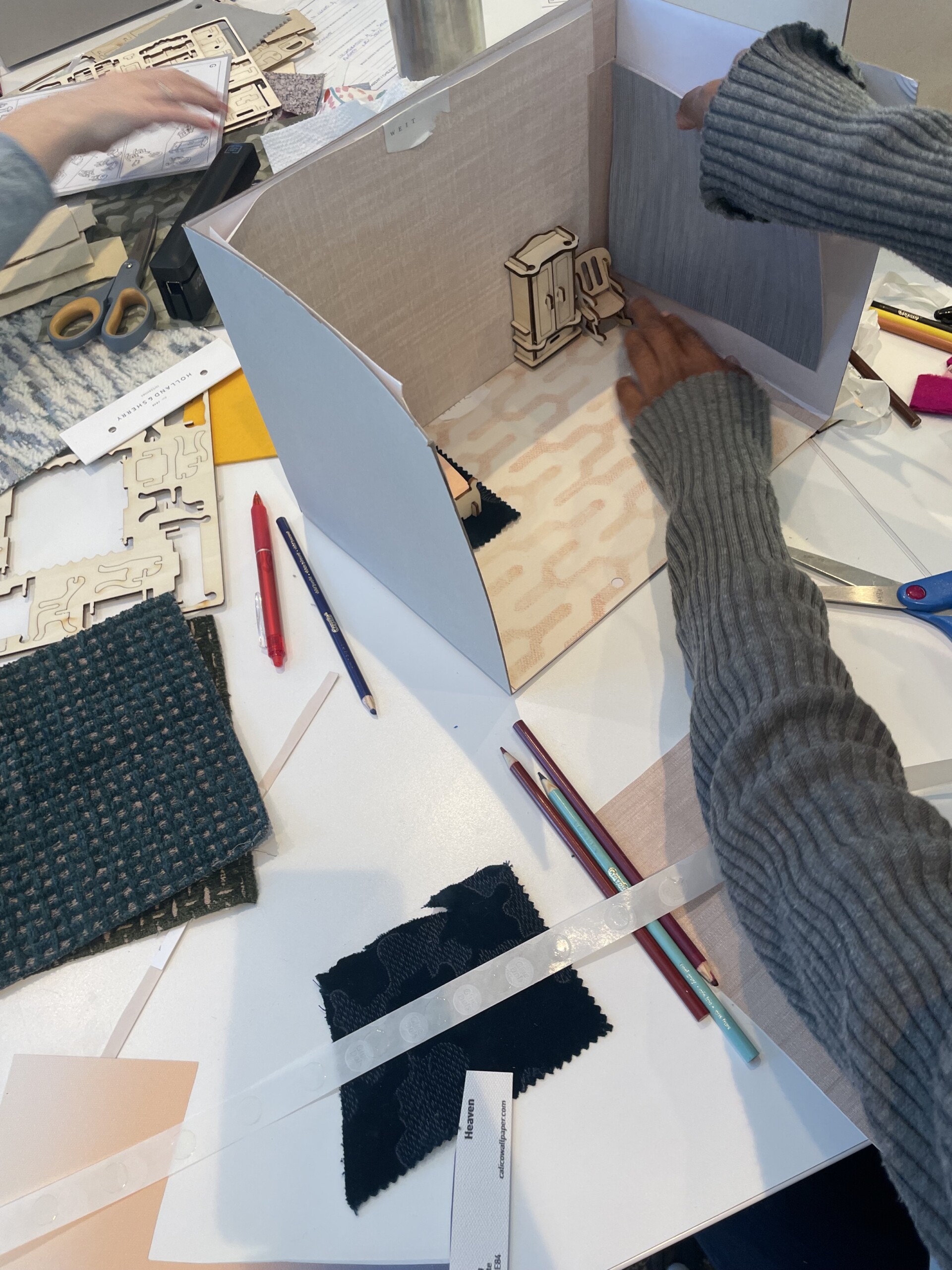 Children build 3-d mockup of their dream house for Pembrooke & Ives Bring your kids to work day