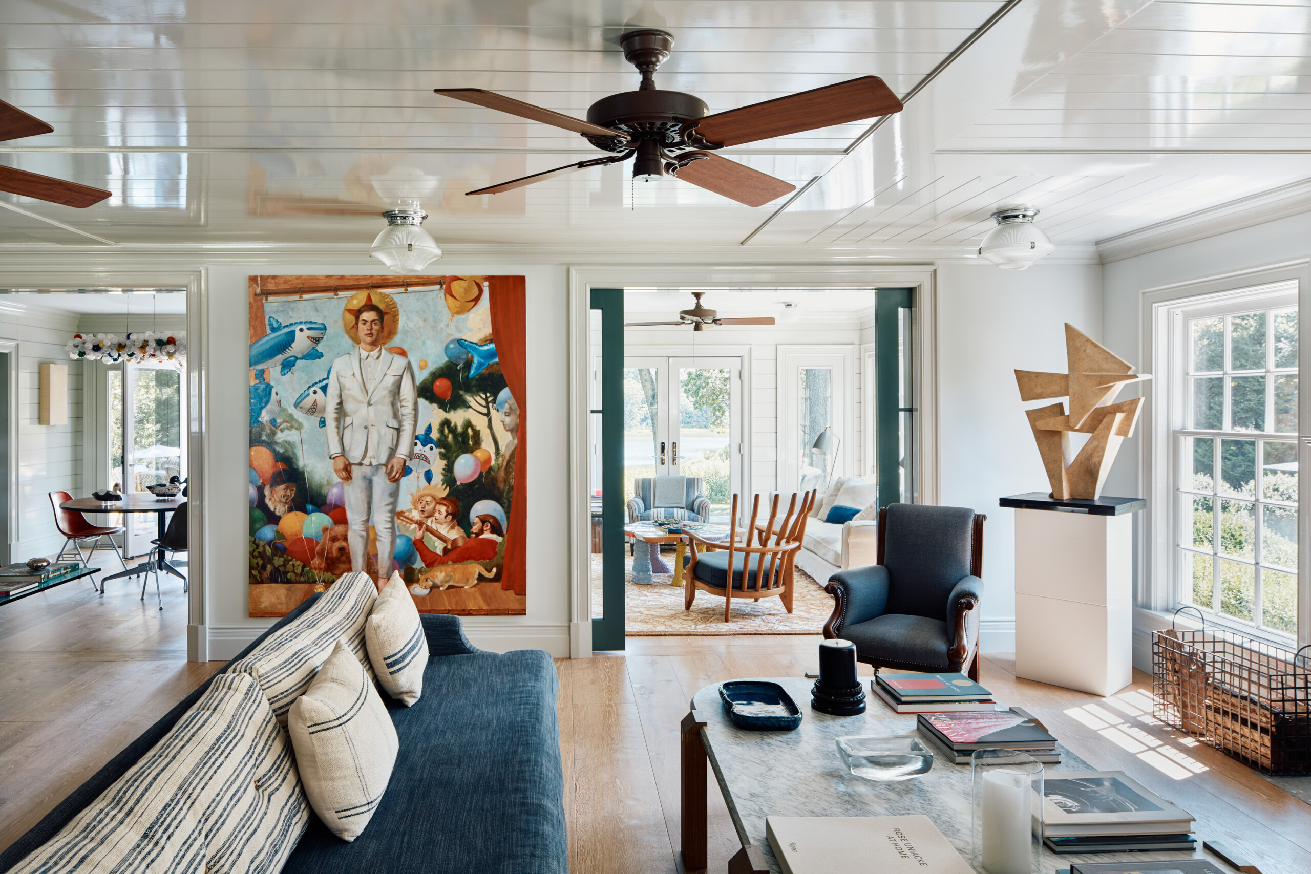 Hamptons Interior Design by Pembrooke & Ives. Open floor plan living space with coastal palette,...