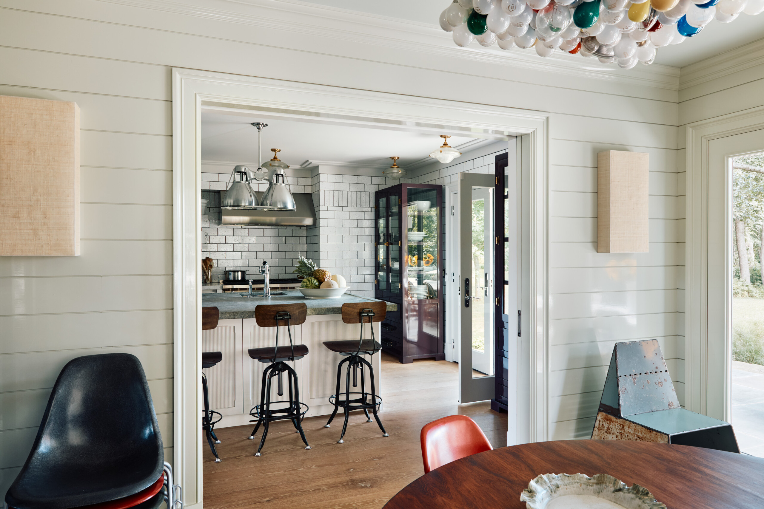 Hamptons Interior Design by Pembrooke & Ives. Chic, comfortable, and contemporary kitchen with...