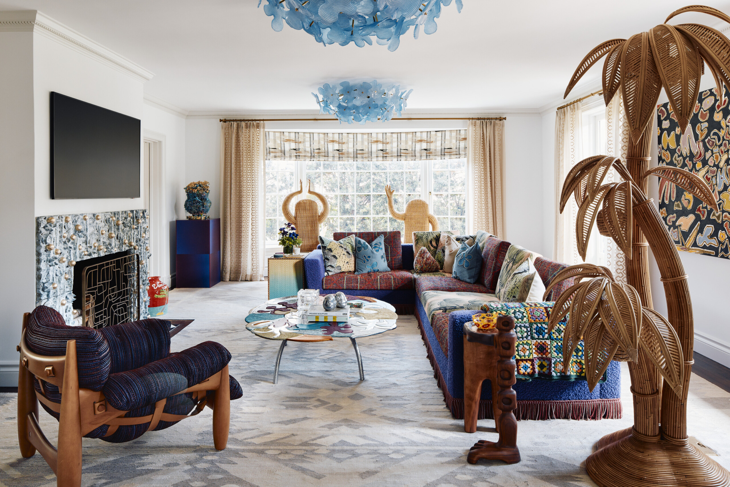 Palm Beach Interior Design by Pembrooke & Ives. Living room with eclectic furnishings, large area...