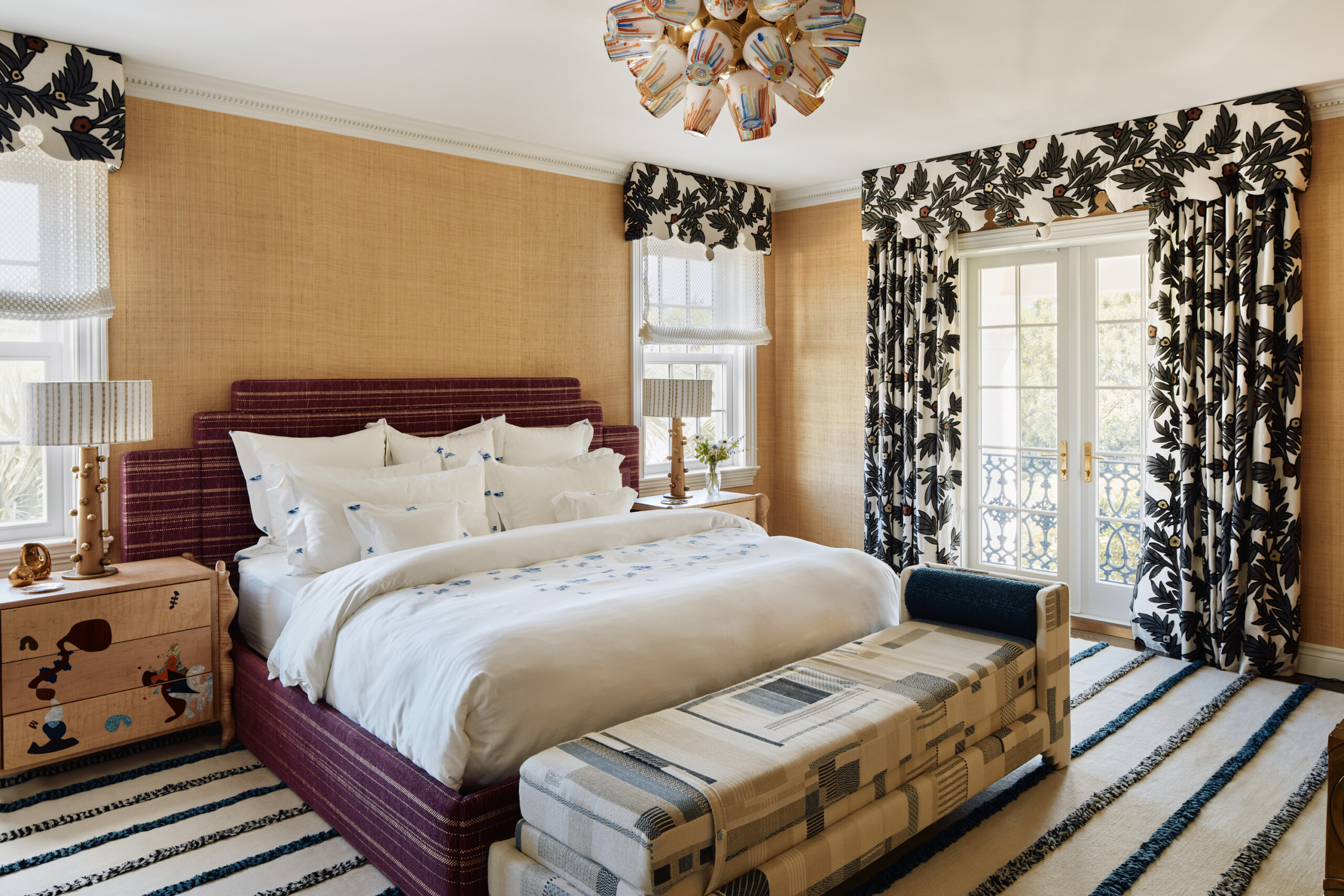Palm Beach Interior Design by Pembrooke & Ives. Primary bedroom with custom headboard, grass cloth...