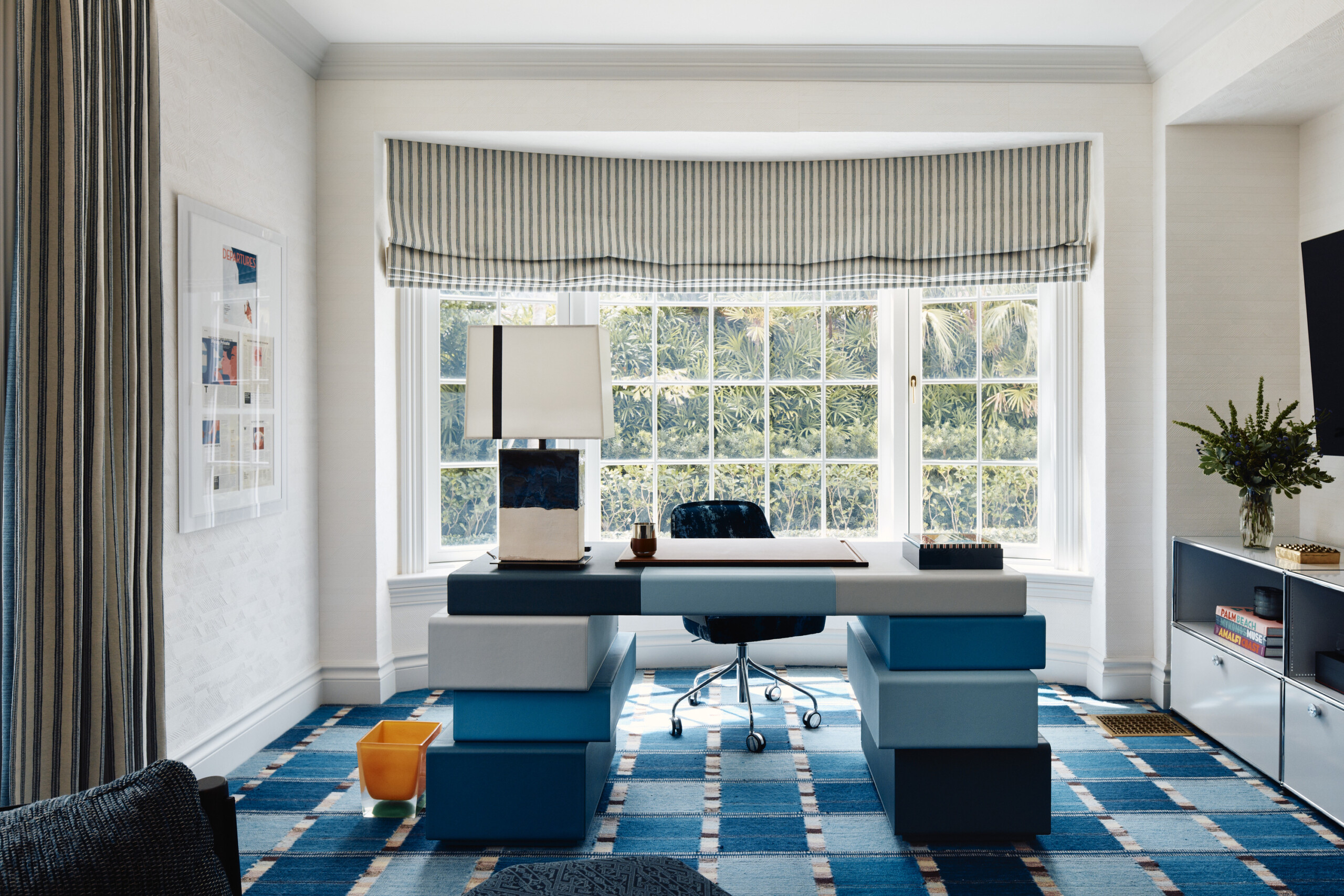 Palm Beach Interior Design by Pembrooke & Ives. Home office with blue carpet, statement blue desk,...