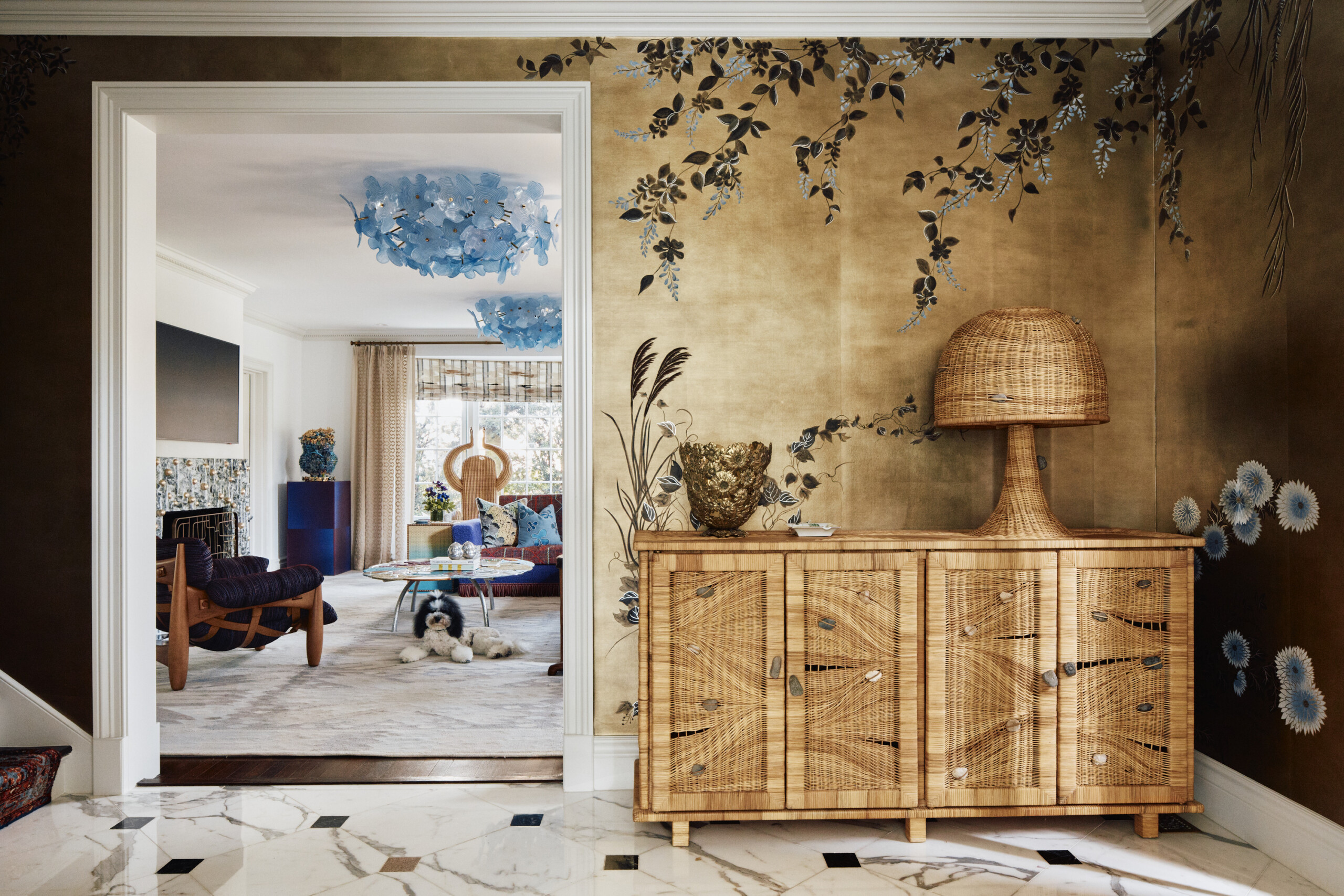 Palm Beach Interior Design by Pembrooke & Ives. Entryway with gold wallpaper, crown molding, marble...