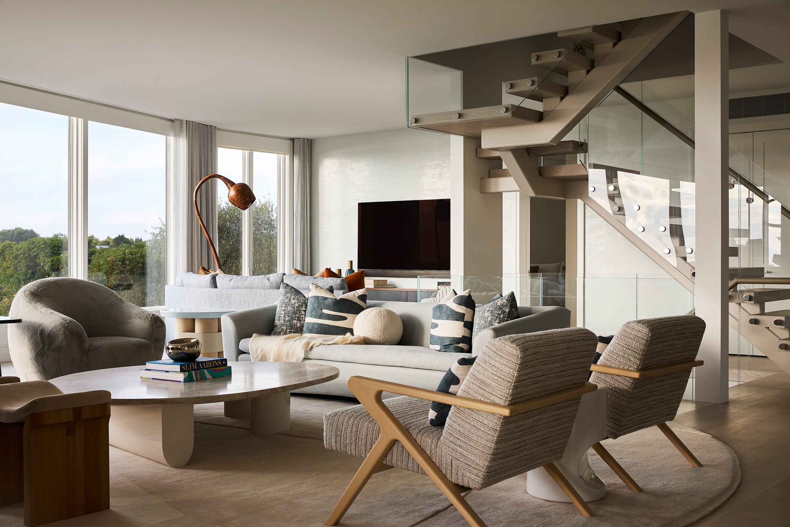 Hamptons Interior Design by Pembrooke & Ives. Textured neutral living room with sitting area and...