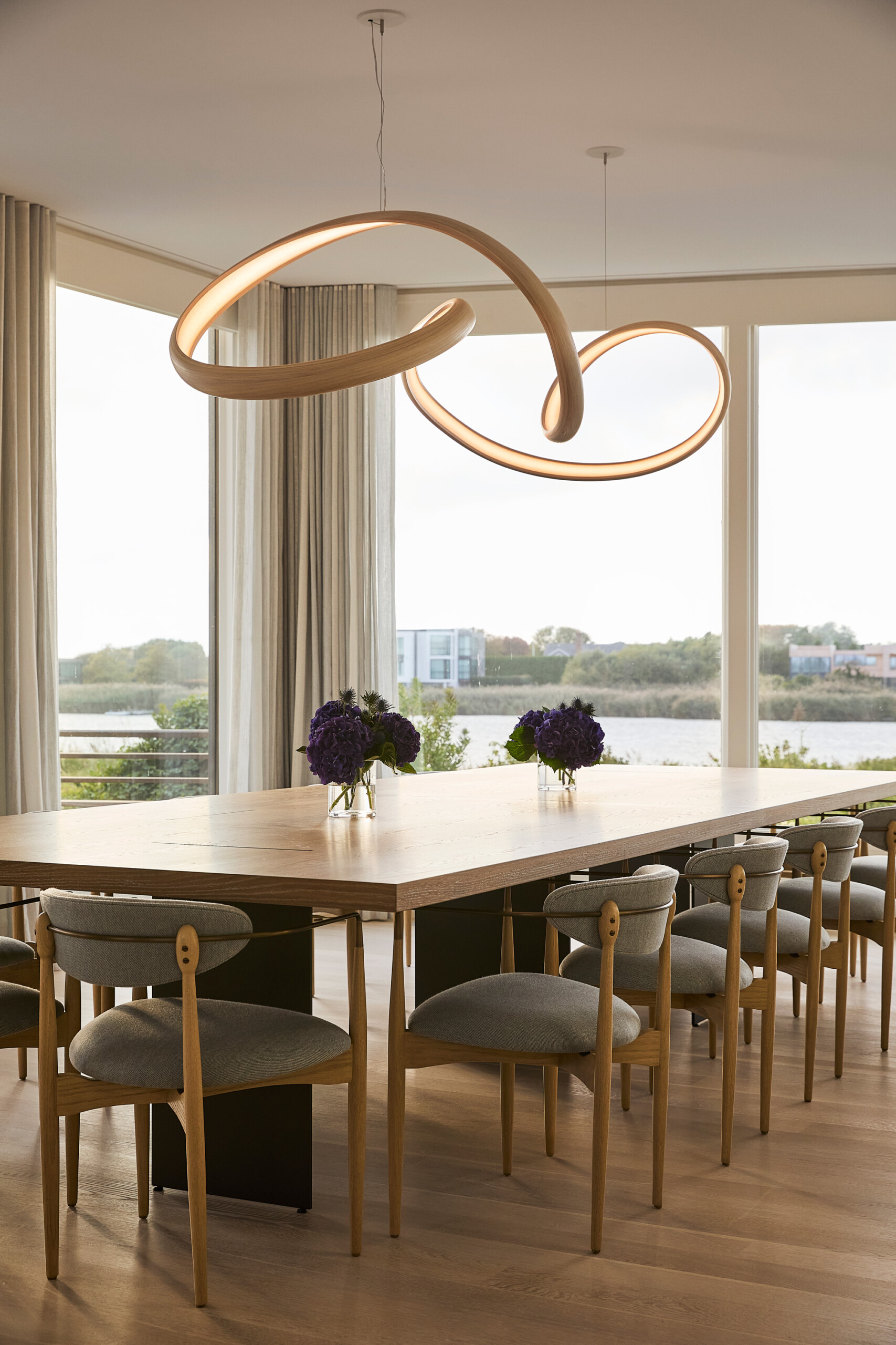 Hamptons Interior Design by Pembrooke & Ives. Dining room long table, neutral dining chairs, sculptural...
