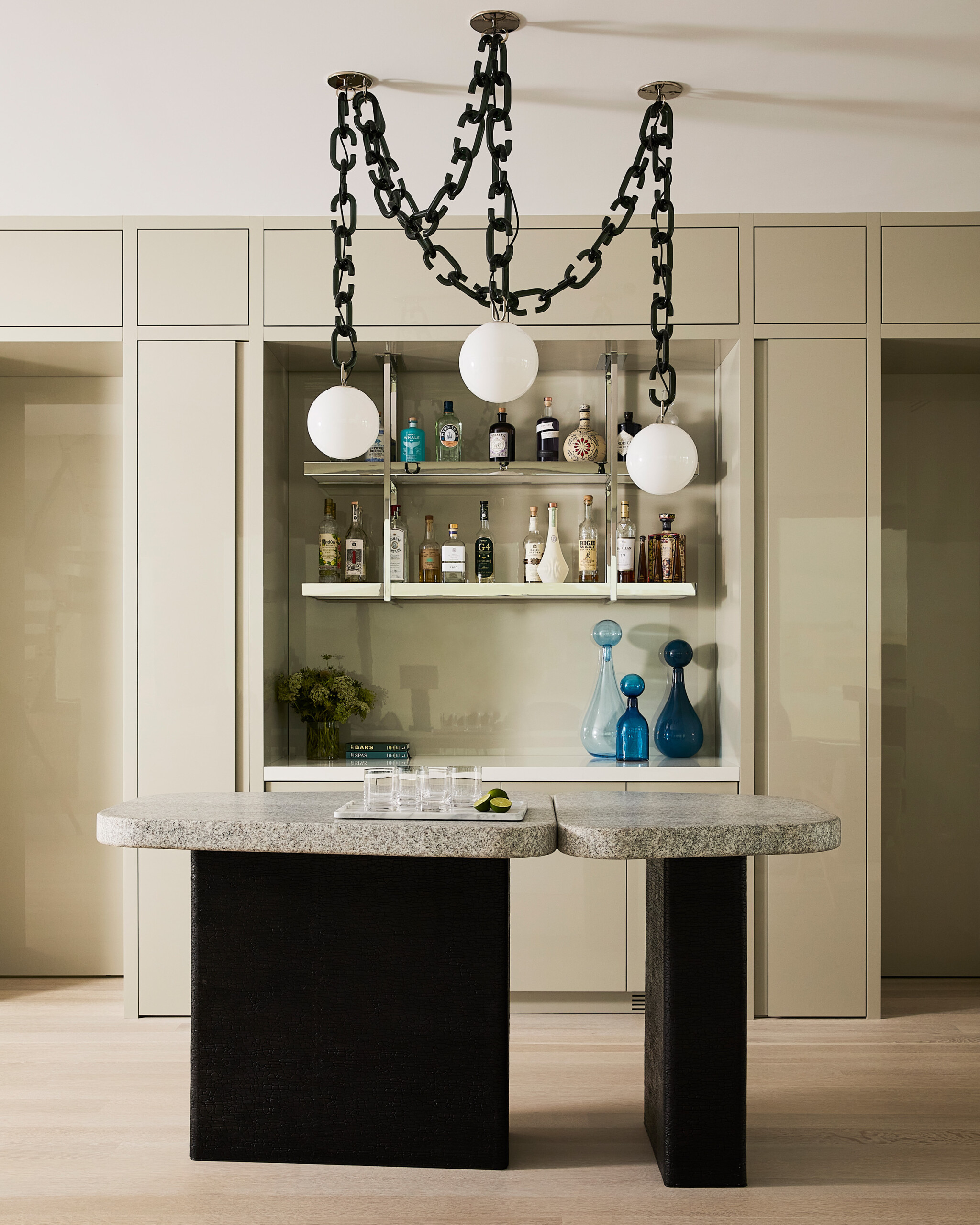 Hamptons Interior Design by Pembrooke & Ives. Built in bar area with glossy lacquered millwork,...