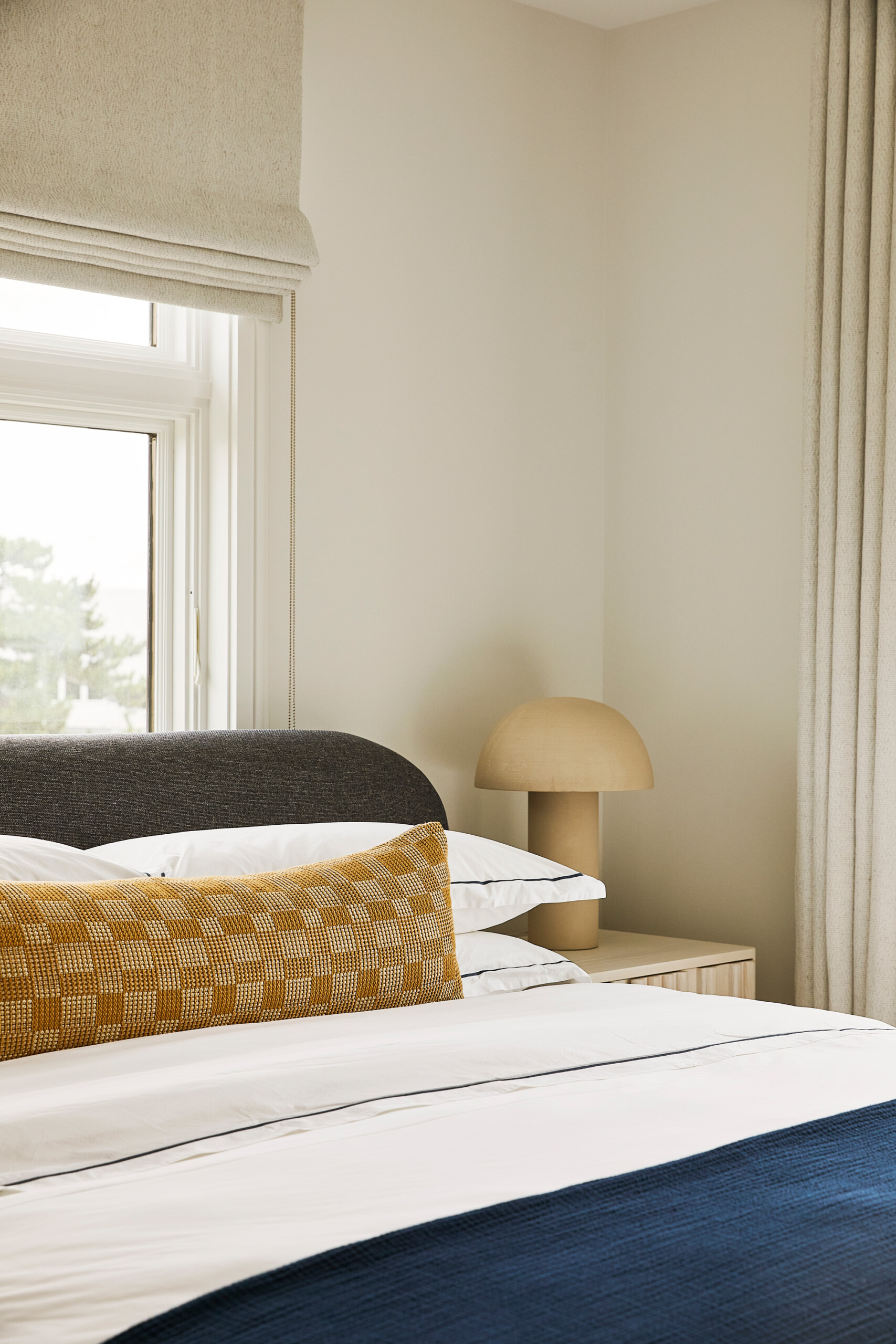 Hamptons Interior Design by Pembrooke & Ives. Clean and neutral bedroom detail shot with custom...