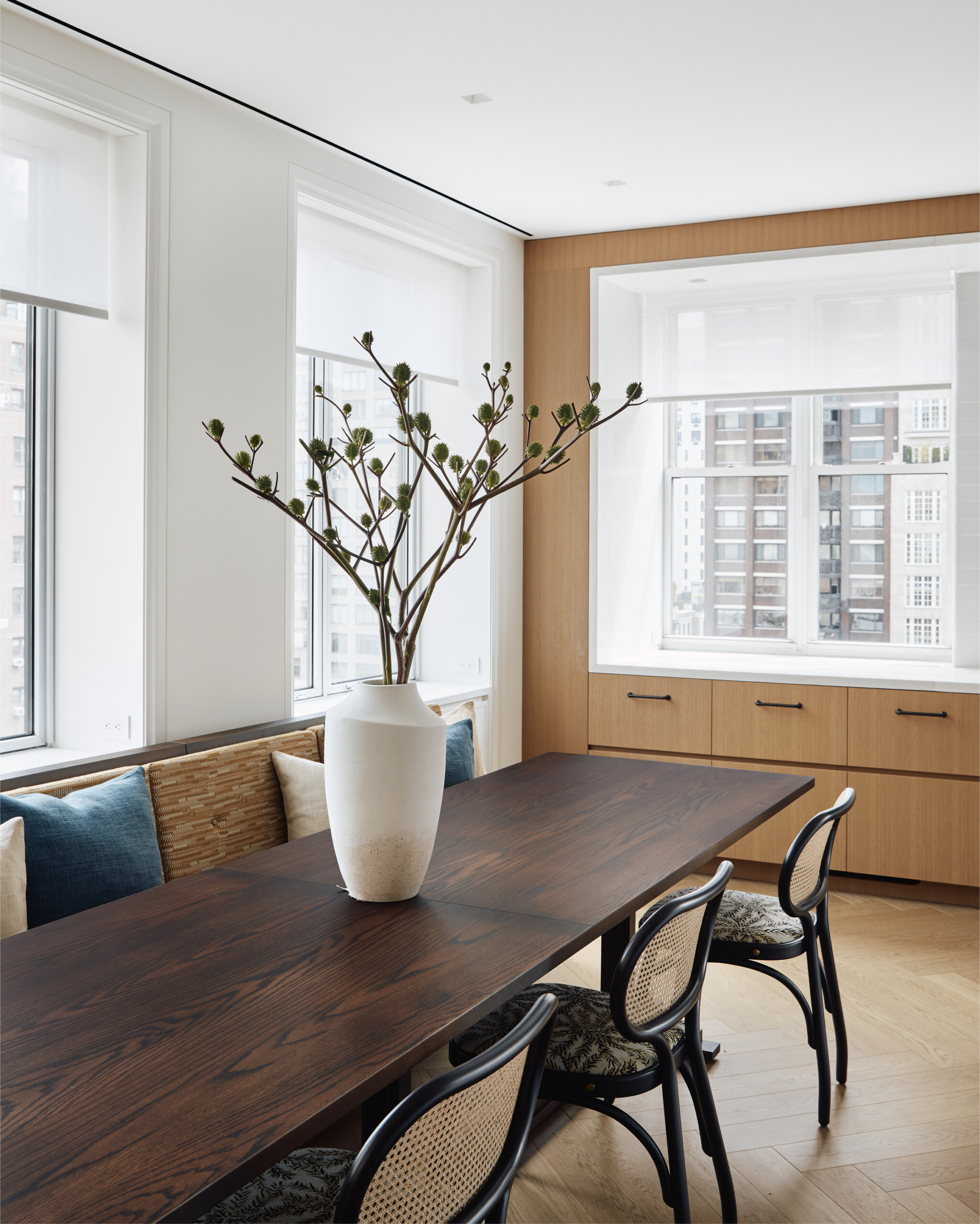 New York City interior design by Pembrooke & Ives. White and wood kitchen with custom millwork.