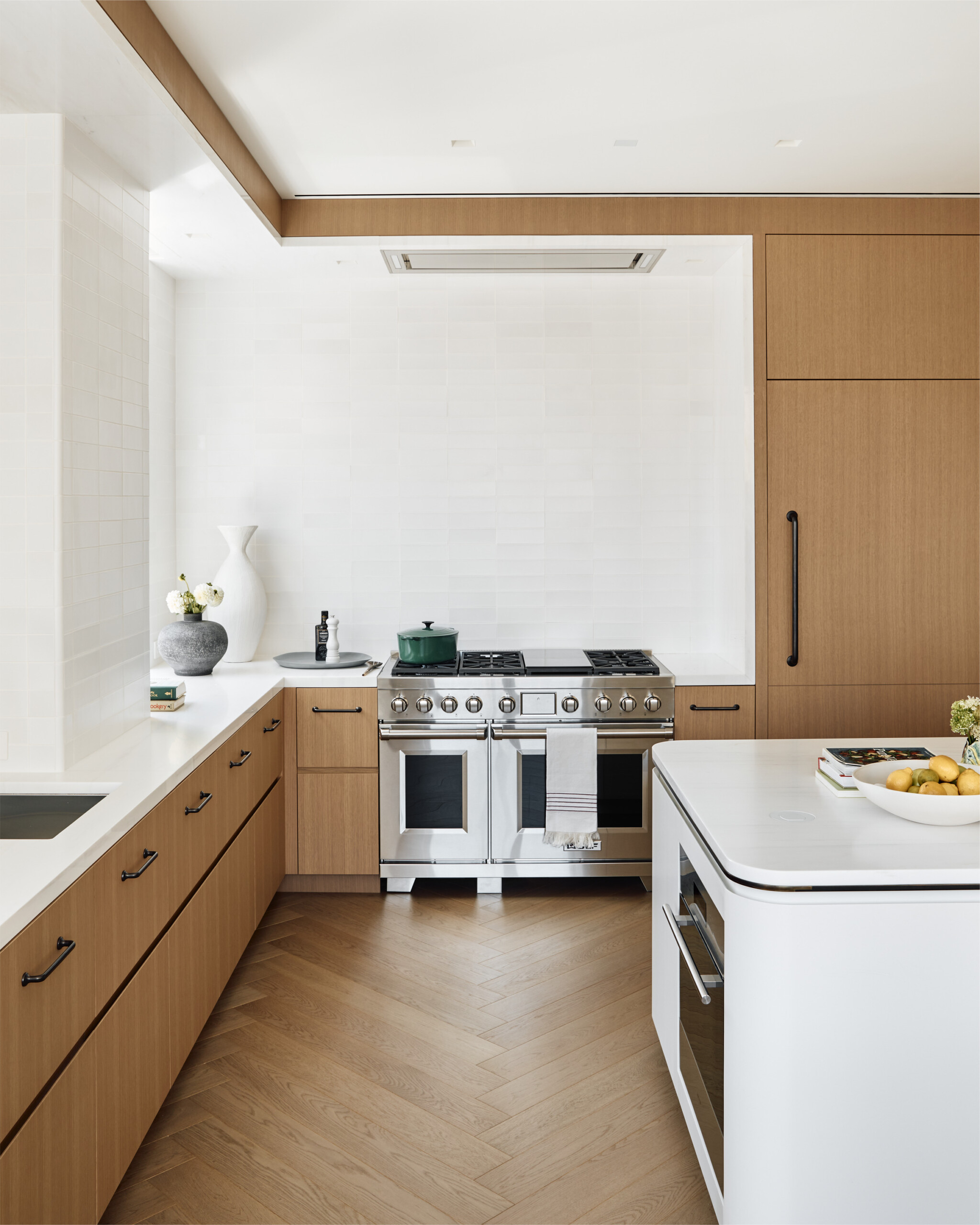 New York City interior design by Pembrooke & Ives. White and wood kitchen with custom millwork.
