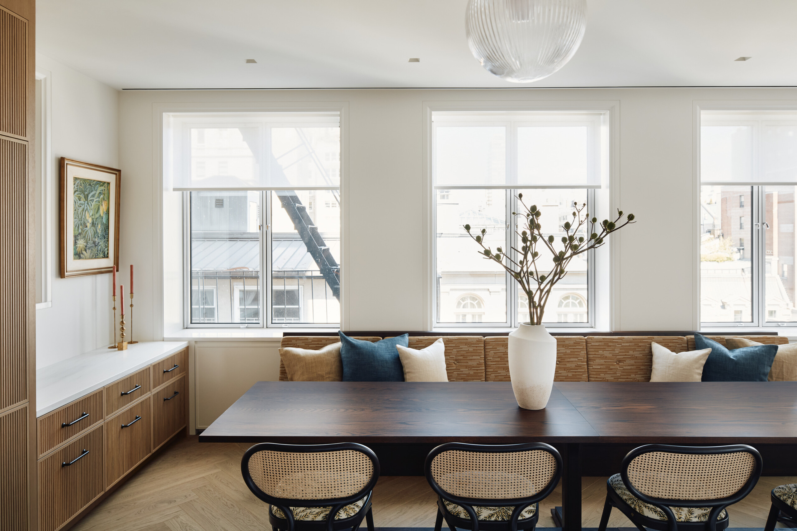 New York City interior design by Pembrooke & Ives. Kitchen dinette with built-in banquette seating.