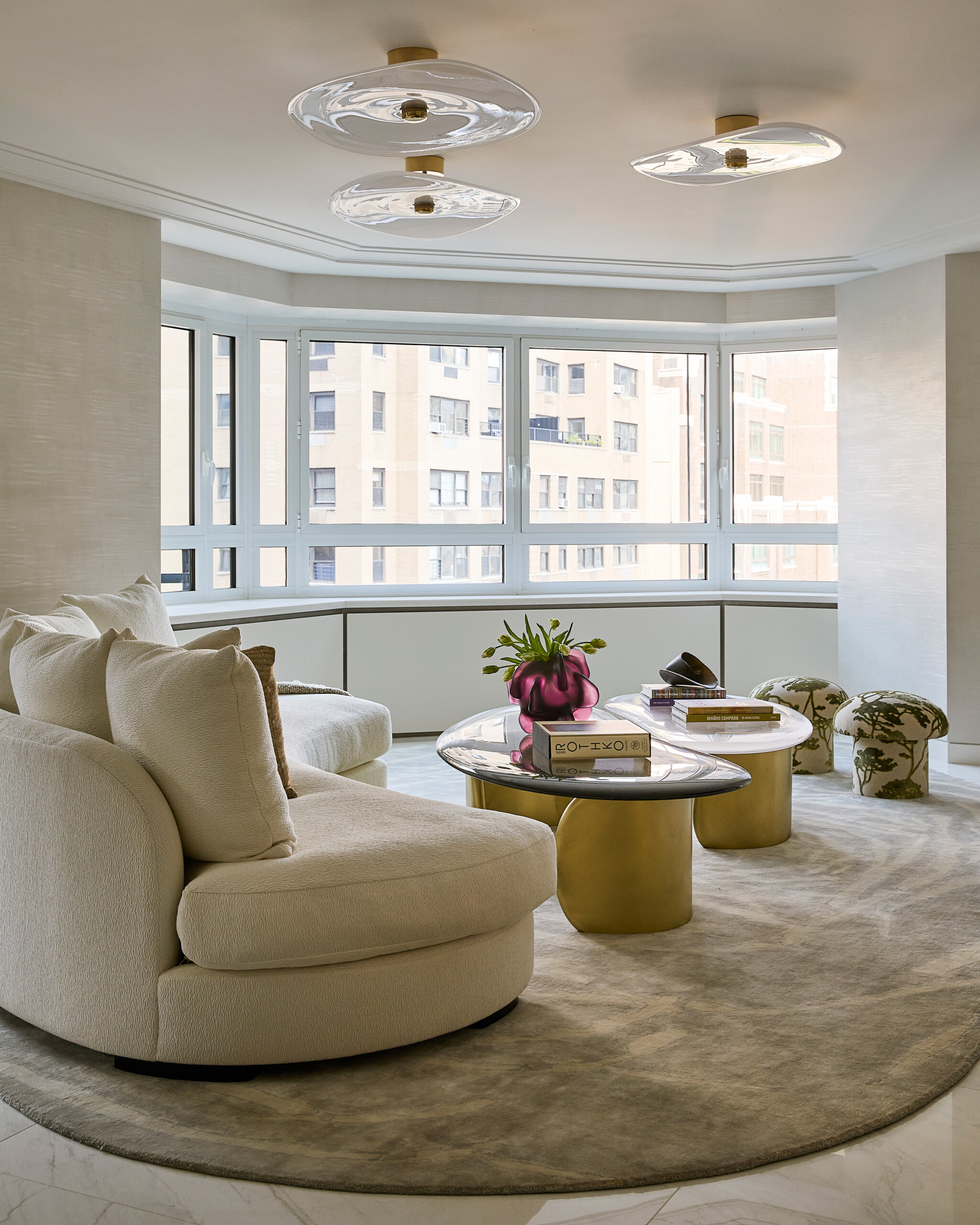 New York City Interior Design by Pembrooke & Ives. Neutral living room with contemporary furnishings.