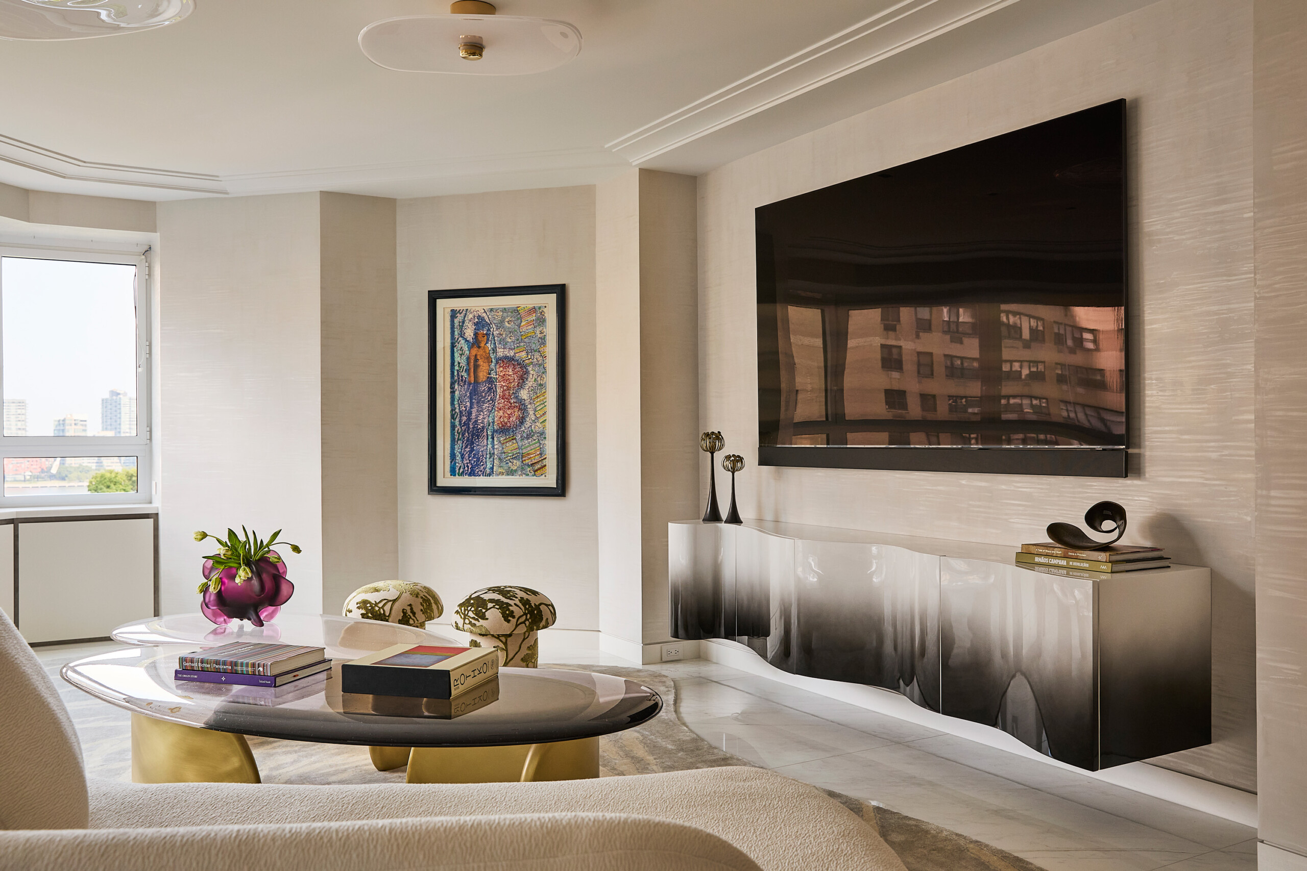 New York City Interior Design by Pembrooke & Ives. Living room with contemporary furnishings and...