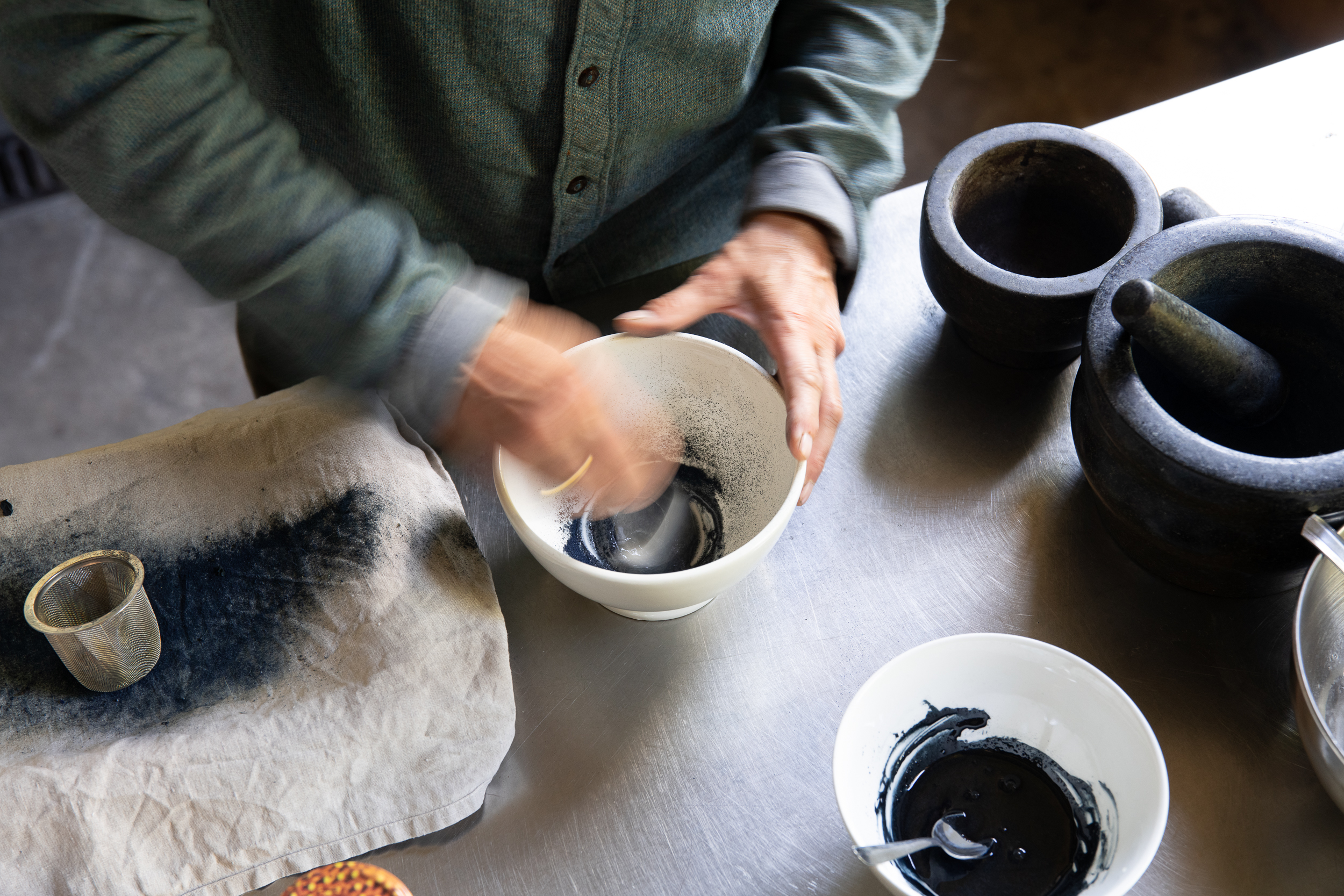 Claudy Jongstra Studio, image shows the process of making natural plant dyes.