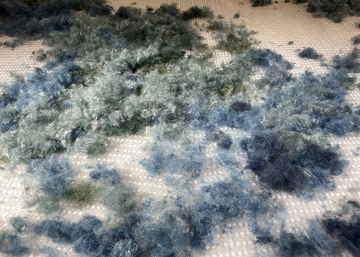 Claudy Jongstra creative process. Image shows beginning stages of a textile artwork made with sheep's...