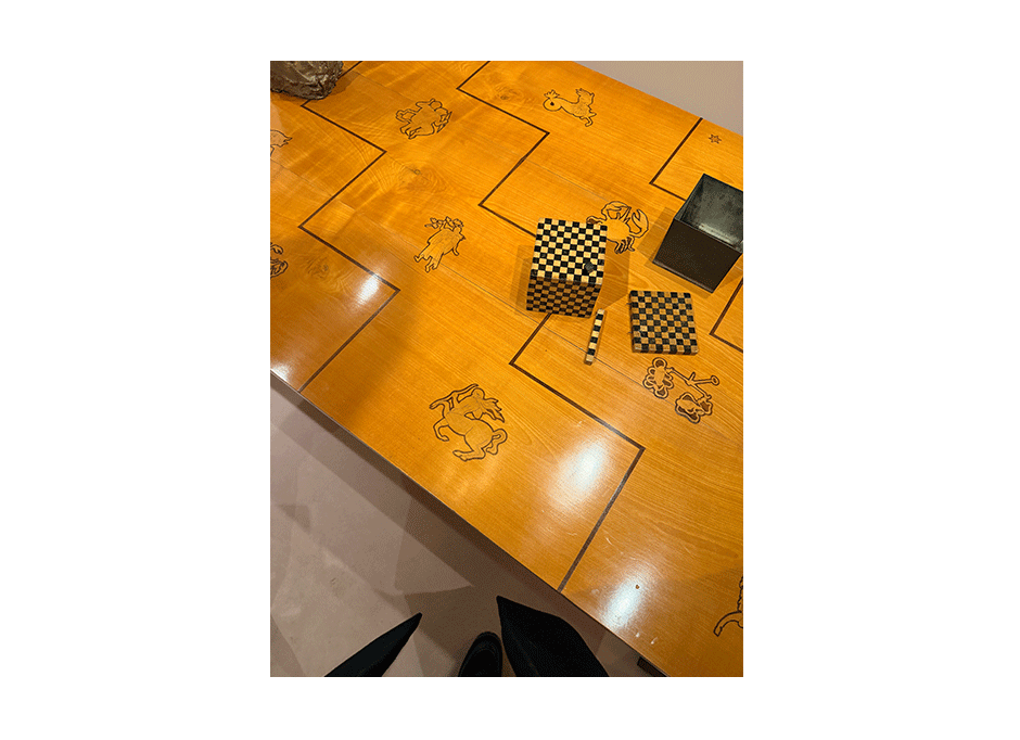 Marquetry table at a vintage shop