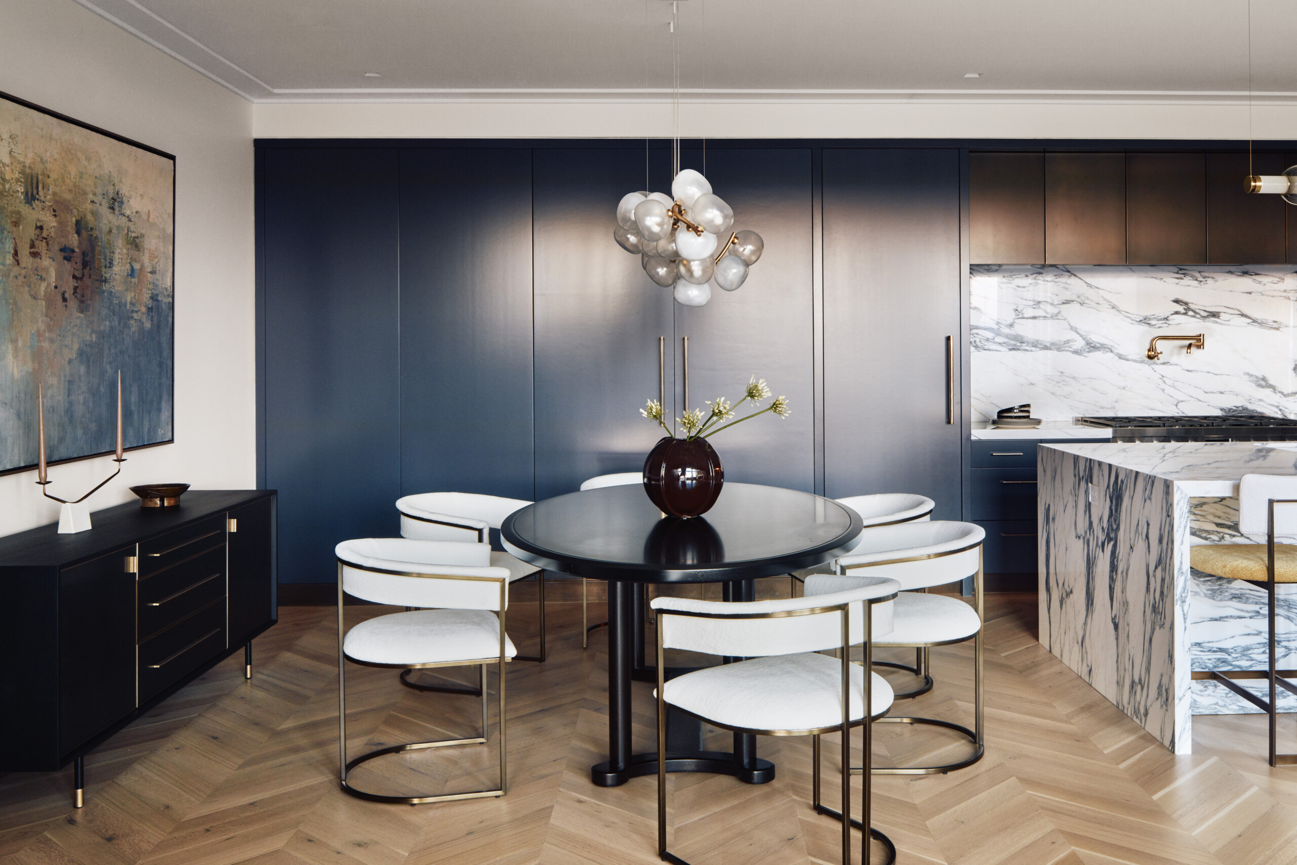 A contemporary dining area located within the kitchen of the Music Row Duplex in Nashville, TN....