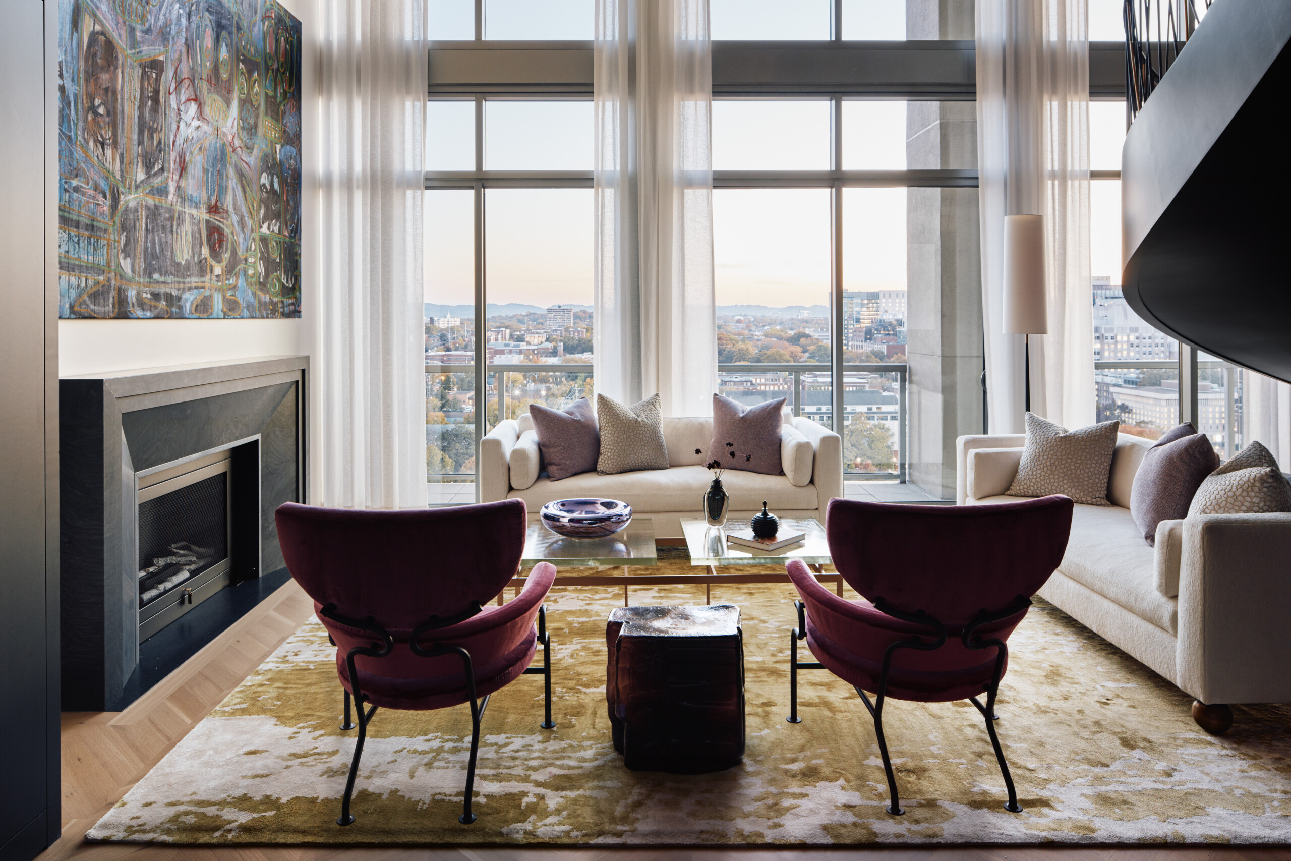 A double-height living room inside the a penthouse apartment in Nashville. The interior design...